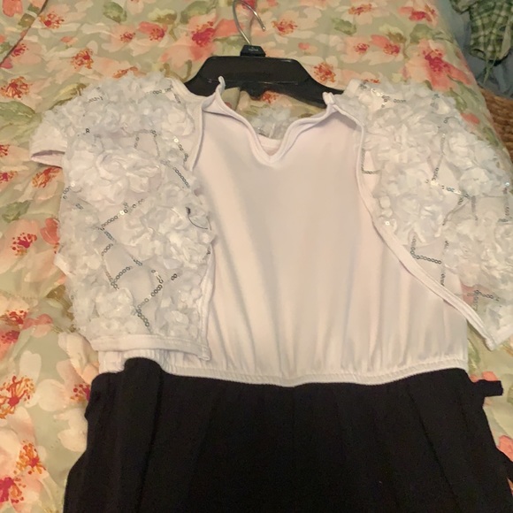 black and white jumper with a little bit of silver on the white - Picture 4 of 4